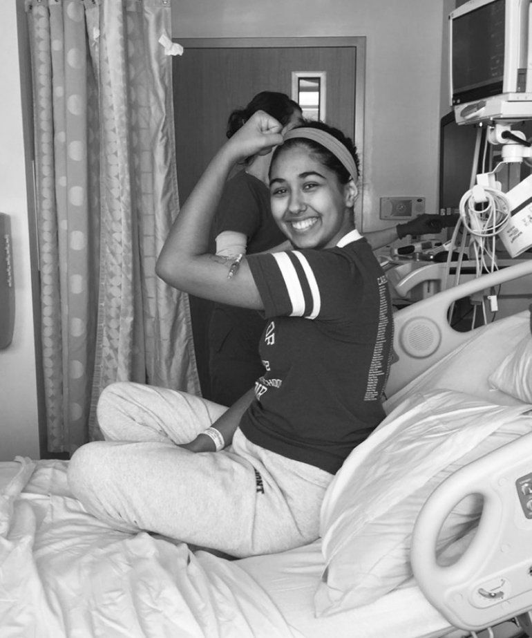 Lily, showing her muscles in the hospital during her last round of chemo.
