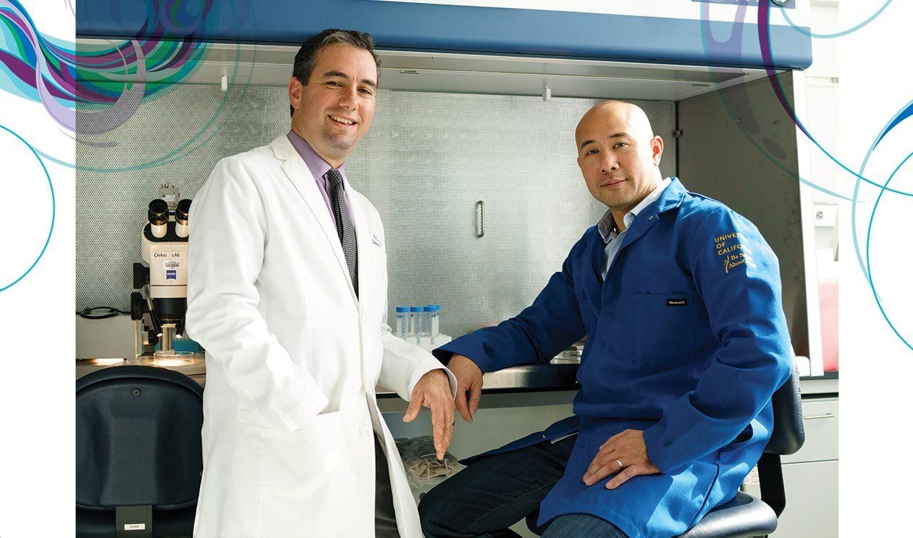 Photo of Ari Green (left) and Jonah Chan (right), in the lab.
