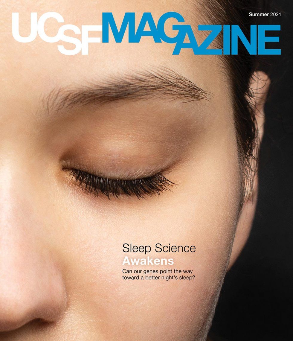 Cover of UCSF Magazine: top reads “UCSF Magazine, Summer 2021”. Closeup photo half of a woman’s face, with her eye closed. Text on her cheek reads “Sleep Science Awakens: Can our genes point the way toward a better night’s sleep?” 