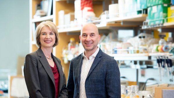 Doudna and Weissman standing in lab