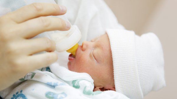 bottle-feeding a newborn