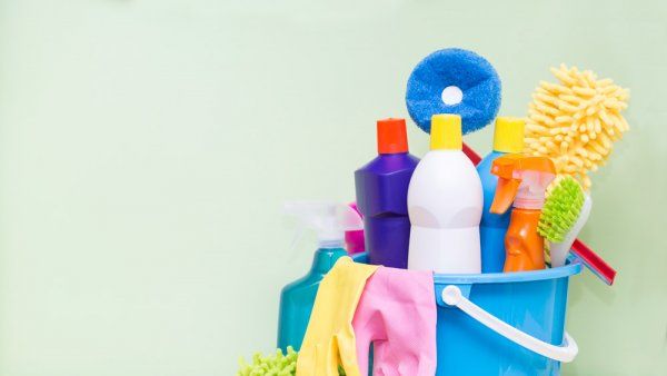 cleaning supplies in a bucket. 