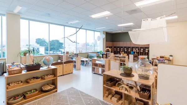 Inside of new child care center with shelves of blocks