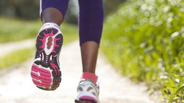 closeup of woman's shoes while she is running