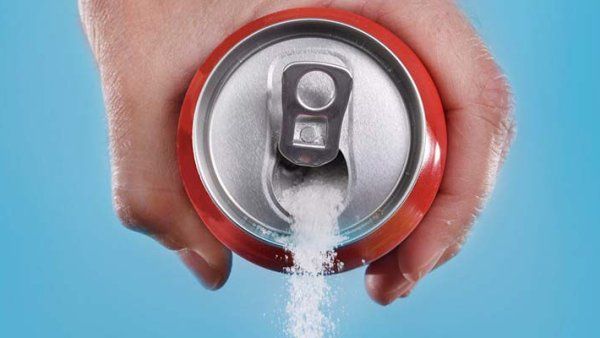 Sugar pouring from a soda can.  