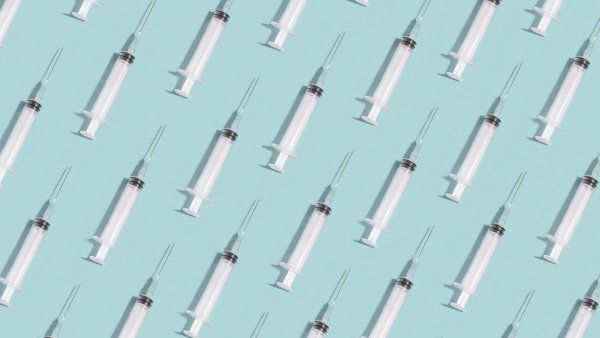 Injection needles in a row, forming a pattern.