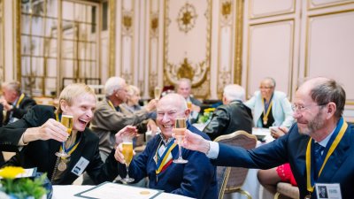 UCSF School of Dentistry alumni toast one another during a celebration to mark the 50th anniversary of the class of 1967’s commencement