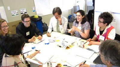 School of Medicine faculty and staff at a table