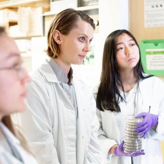 Lina Leon, PhD, Adair Borges, a BMS graduate student, and Allyson Park, an undergraduate student and lab assistant, study microbial genetics and evolution in the Bondy-Denomy Lab