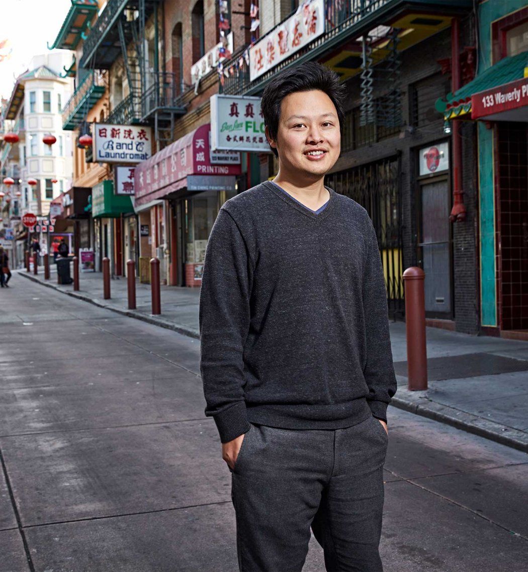 Photo of Richard Feng, MD, on a street in Chinatown, San Francisco.
