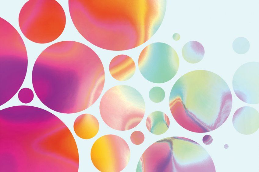 Illustration of floating circles with marbled colors inside, with a gradation from bright pink to light blue, to represent cancer cells.