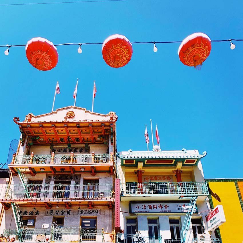 Photo of buildings and hanging paper lanterns in San Francisco’s Chinatown.