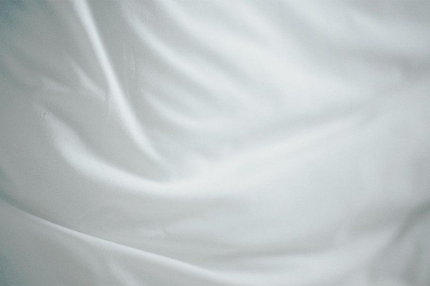 Photo of a white sheet.
